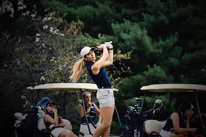 photo of Nicholle playing golf