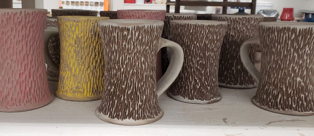 A photo of textured mugs